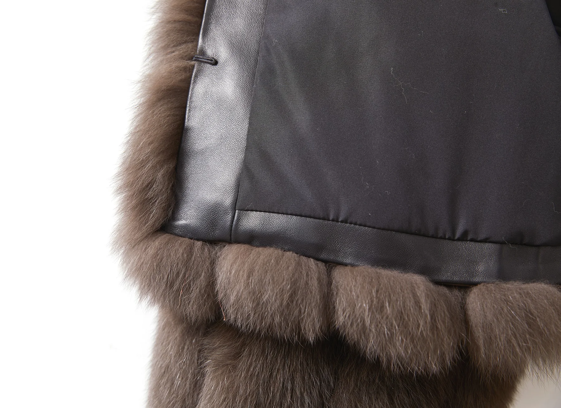 Fox fur hem with a leather band and dark lining detail