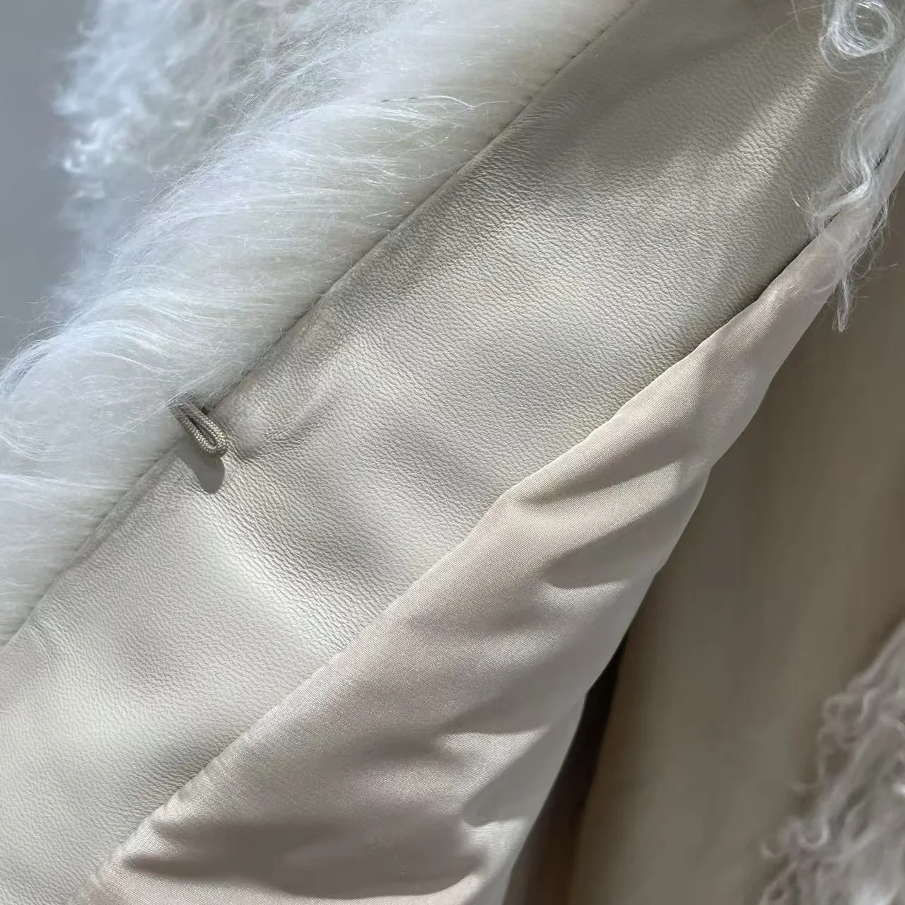 Short-Sleeve Mongolian Wool Fur Jacket — lining detail