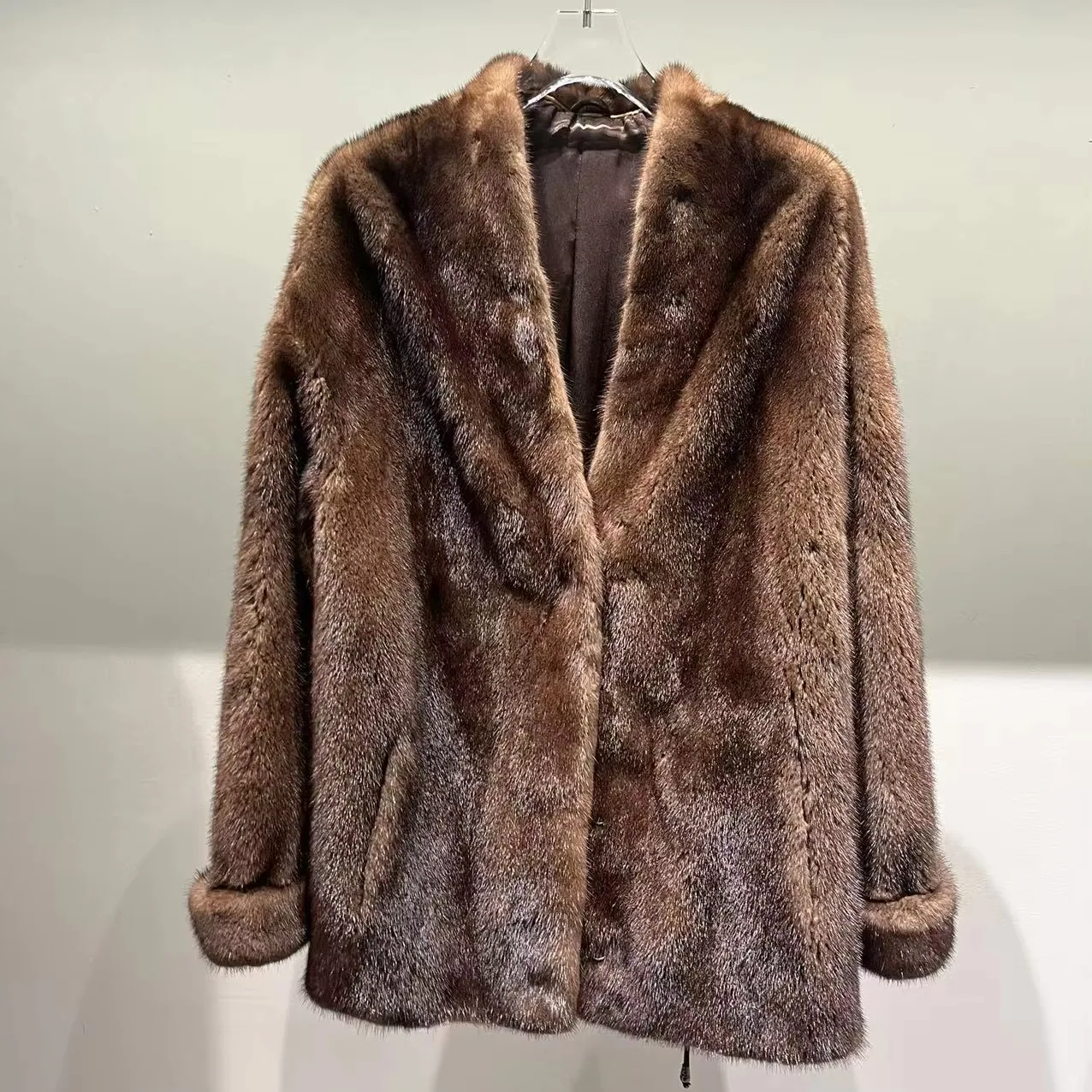 Brown mink fur V-neck coat with side pockets — front reference