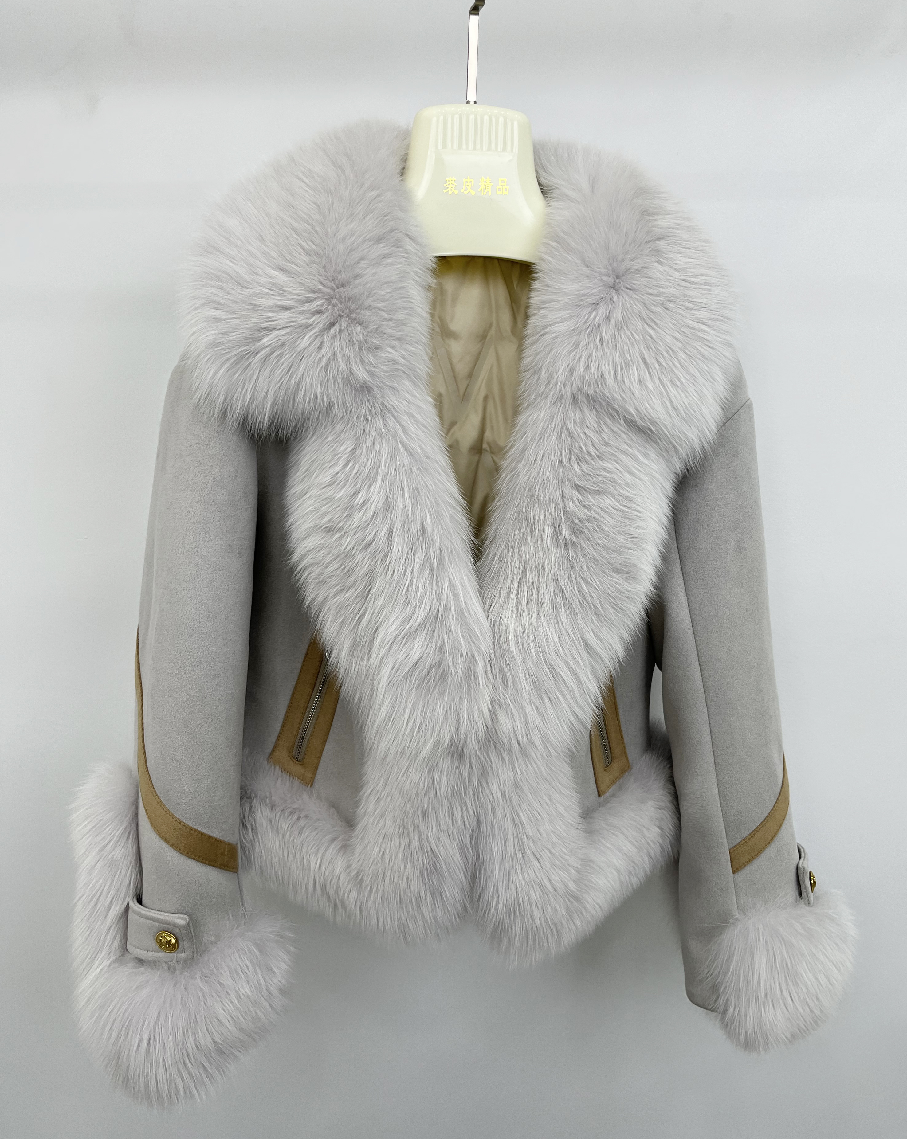 Grey fox fur trim lapel jacket, front view with contrast sleeve accents