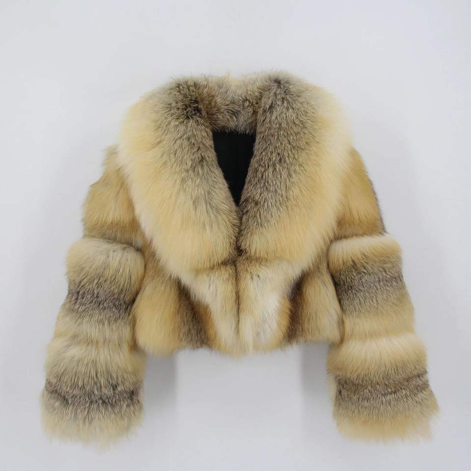 Golden-tone cropped jacket reference with contrast sleeve panels