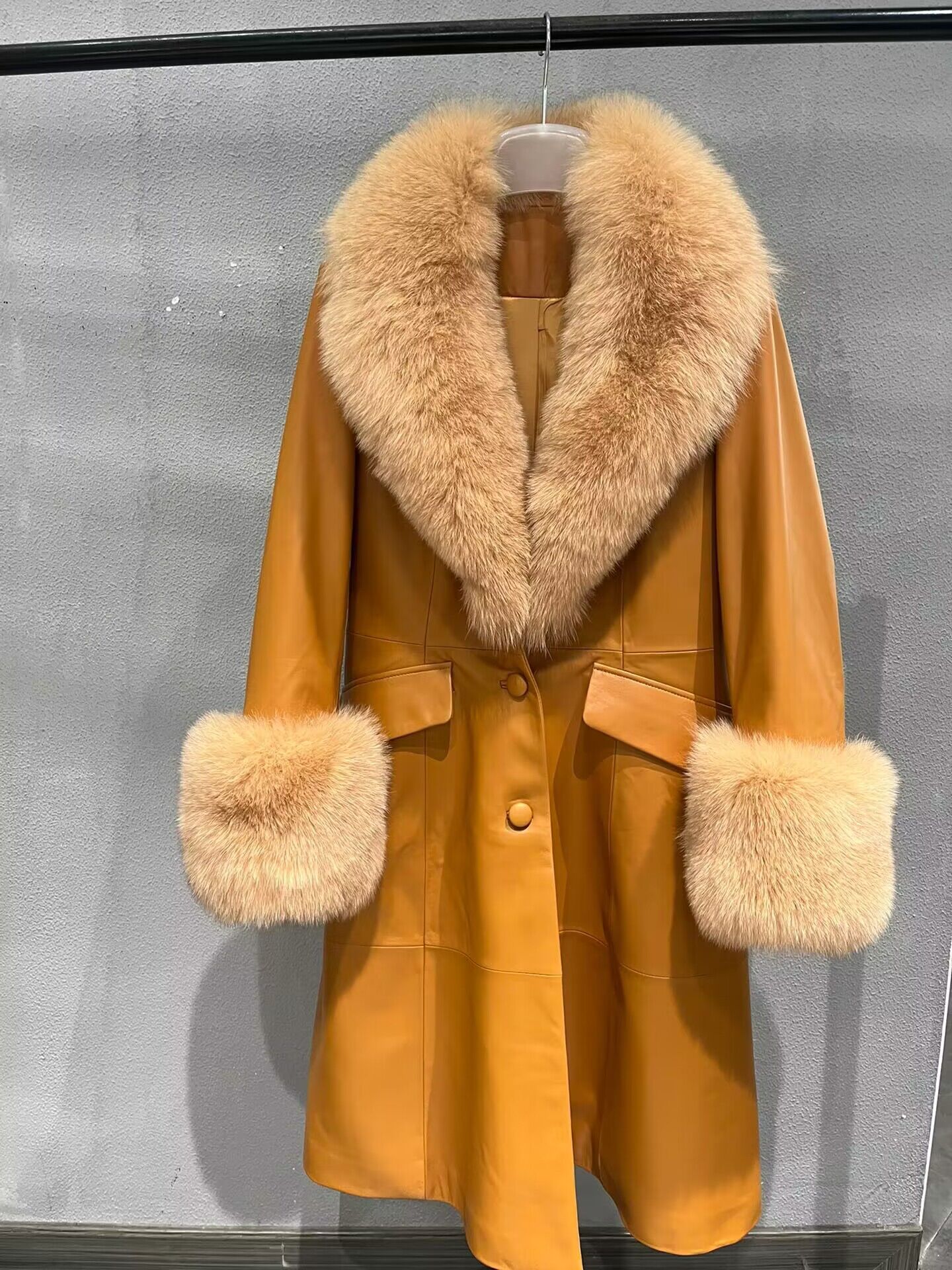 Camel long leather coat reference with a wide fur collar and cuffs