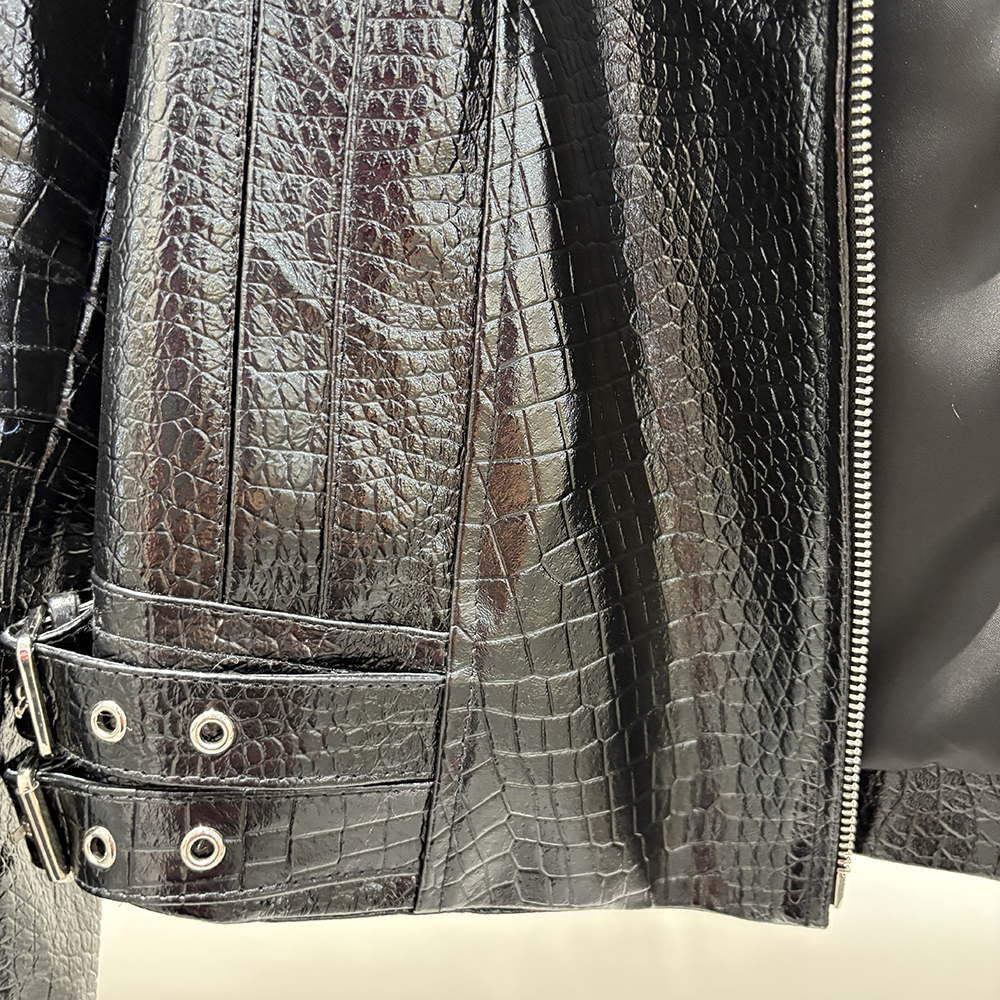 Sheepskin jacket hem and hardware detail
